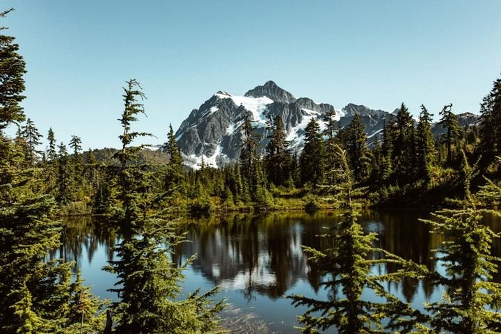Mountain landscape in an illustrative travel interface